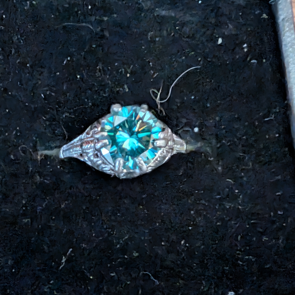Elegant Silver Ring with Blue Moissanite Gem